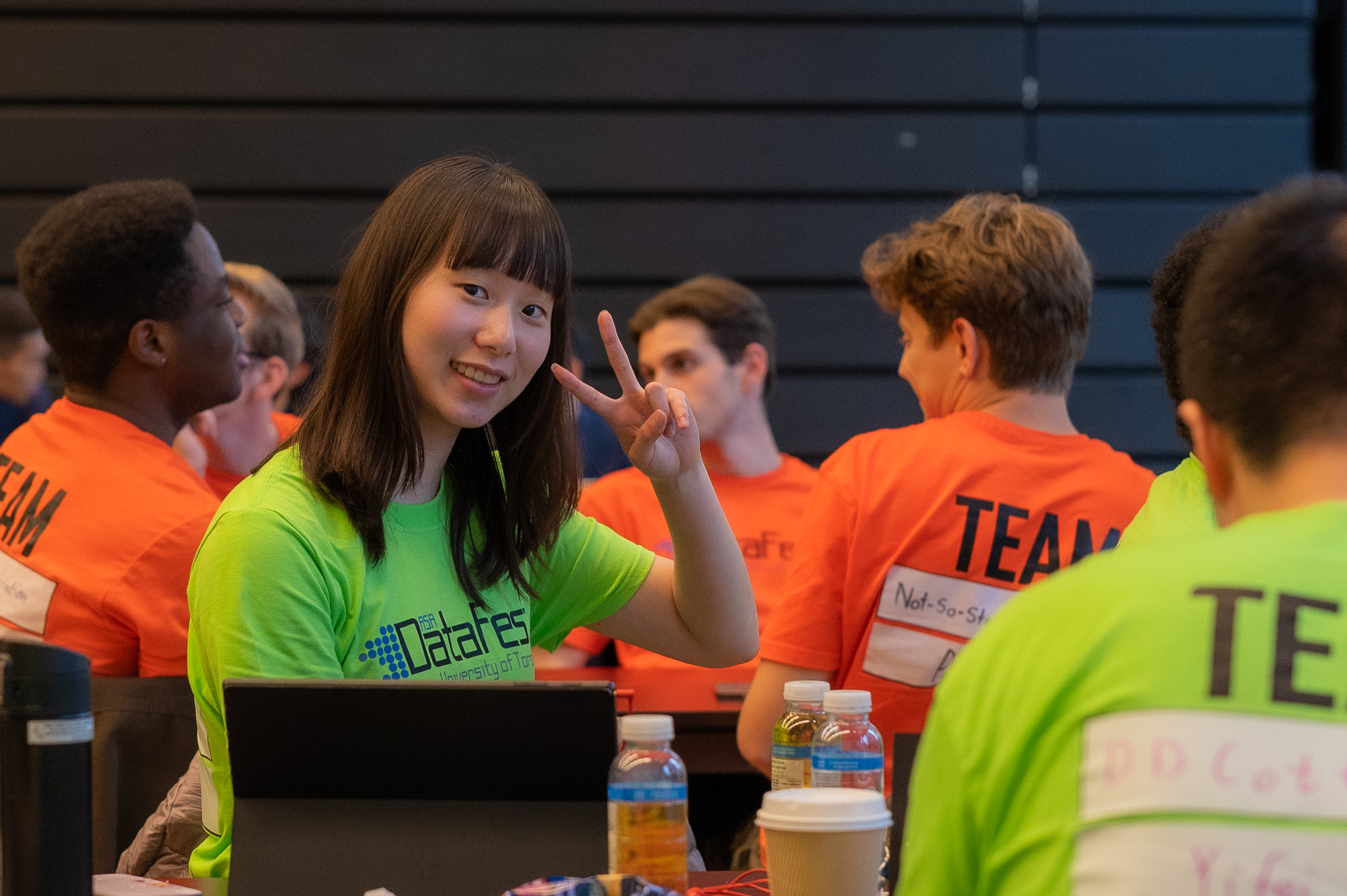 Student giving a peace sign