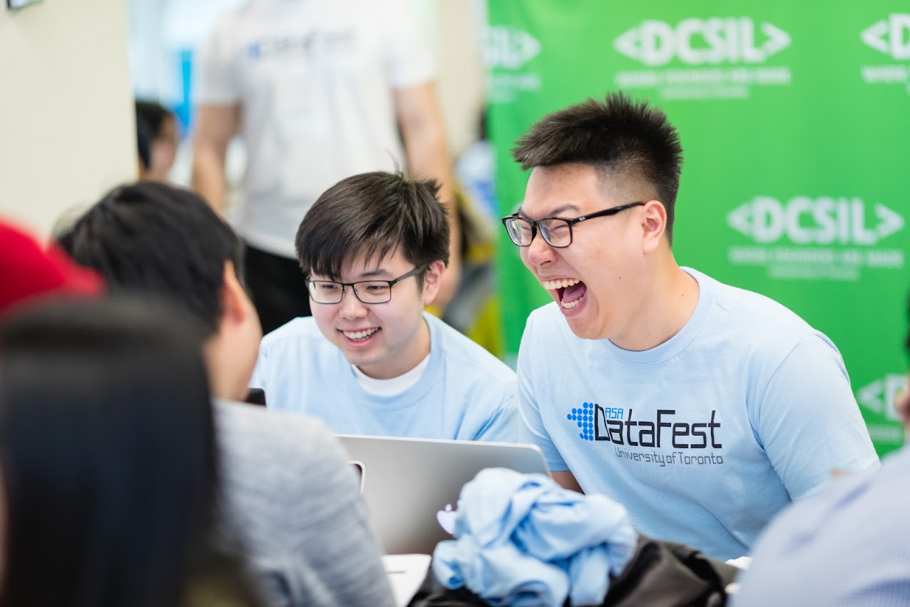 Two participants in DataFest @ UofT smailing