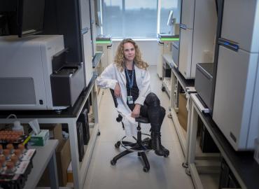 Picture of a faculty member Lisa Strug in a lab